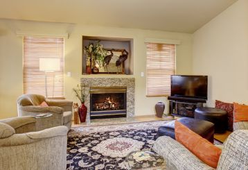 Create a luxurious dining experience with customized woven wood blinds, adding a touch of sophistication to the decor.